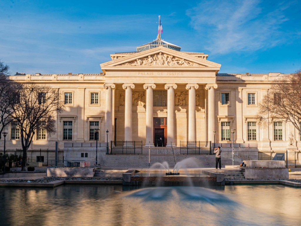 pexels-photo-15273107-15273107 Palais de Justice reflecting neoclassical architecture with fountain in Marseille.