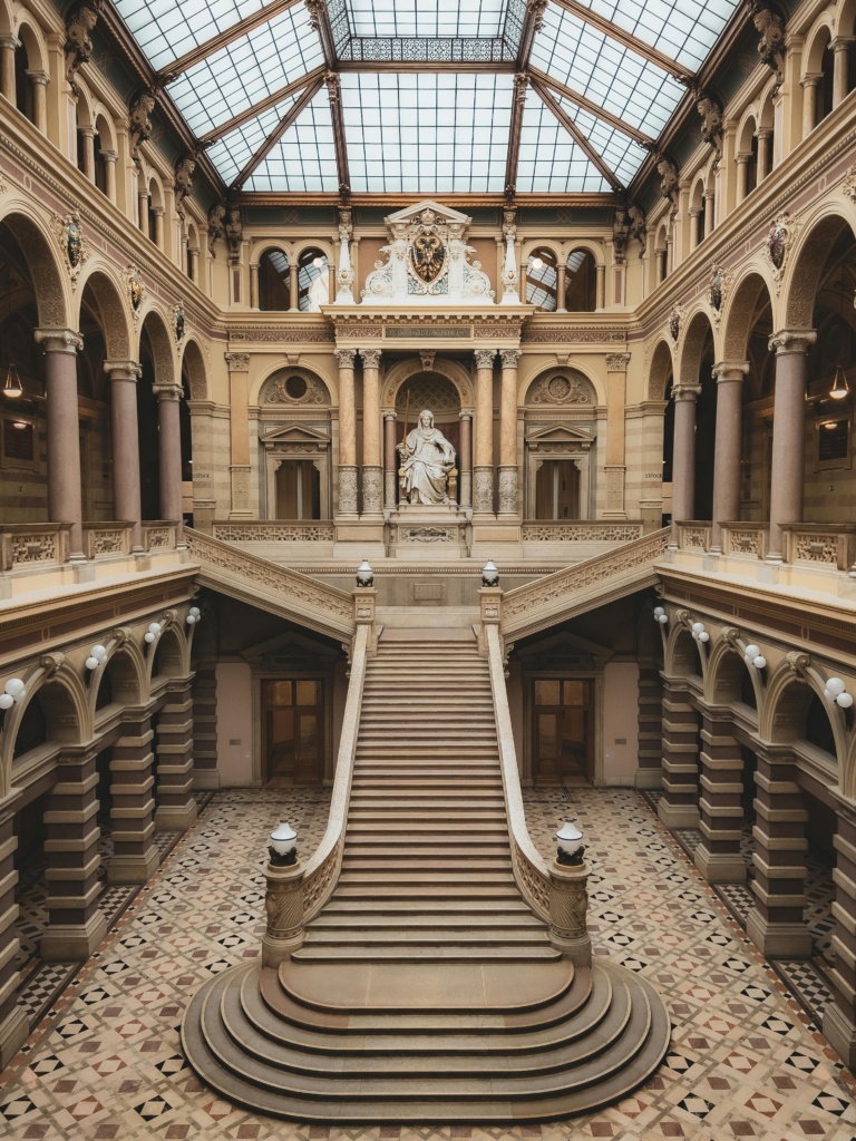 pexels-photo-15686925-15686925 Majestic staircase inside a historic palace in Vienna, showcasing classic architecture.